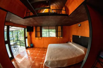 Cama o camas de una habitación en Cabañas Tonal Mesti