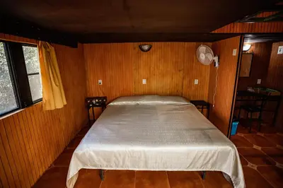 Cama o camas de una habitación en Cabañas Tonal Mesti