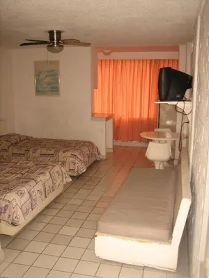 Cama o camas de una habitación en Hotel Delfines Acapulco by NG Hoteles