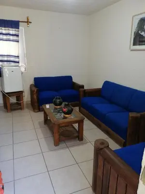 Zona de estar de Departamento la crucecita, con aire acondicionado, excelente ubicación, en segunda planta