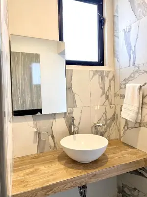 Un baño de Capital Suites