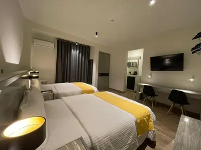 Una televisión o centro de entretenimiento en Capital Suites