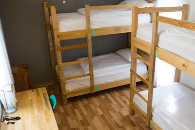 Cama o camas de una habitación en Hostal Tres Central