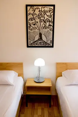 Cama o camas de una habitación en Hostal Tres Central
