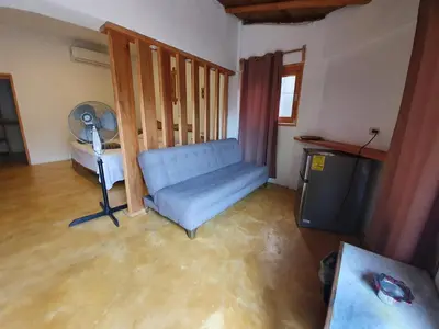 Zona de estar de LUNA DE MIEL con aire acondicionado