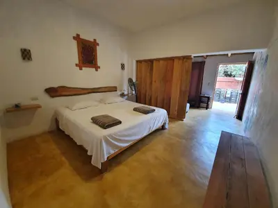 Cama o camas de una habitación en LUNA DE MIEL con aire acondicionado