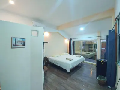 Cama o camas de una habitación en LUNA DE MIEL con aire acondicionado