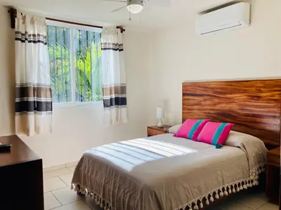 Cama o camas de una habitación en El Colorín, a condo in the heart of Huatulco