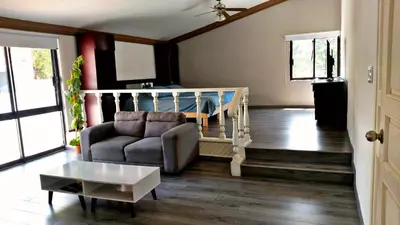 Zona de estar de Casa Luna con alberca para 26 personas Cuernavaca