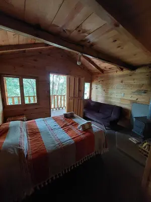 Cama o camas de una habitación en Cabaña en el Bosque de San José del Pacifico 2