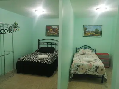 Cama o camas de una habitación en DEPARTAMENTO MUY CERCANO AL AEROPUERTO CD. MEX T2