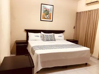 Cama o camas de una habitación en Hotel Dorado a una calle de Playa Regatas y el Malecon