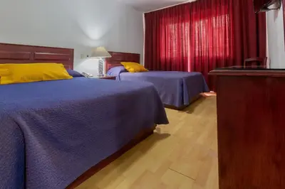 Cama o camas de una habitación en Hotel Gala Oaxaca