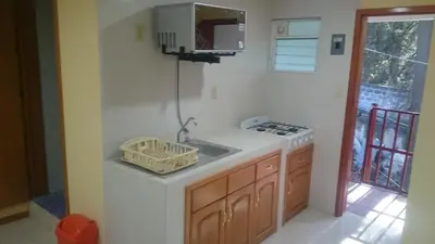 Una cocina o zona de cocina en Alberca climatizada, con departamento para grupos!!