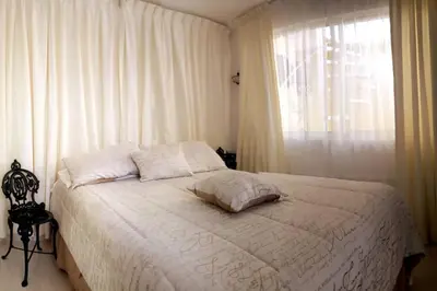 Cama o camas de una habitación en Habitación Jorge Negrete - Habitación independiente con baño privado y bella terraza común