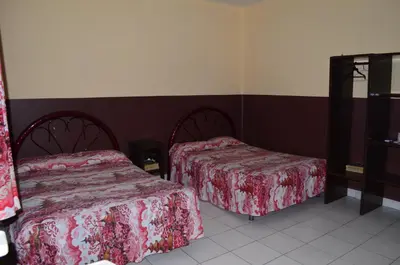Cama o camas de una habitación en Hotel Del Centro