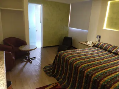 Cama o camas de una habitación en Hotel Siesta del Sur