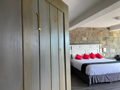 Cama o camas de una habitación en Vista Zacatlan Hotel