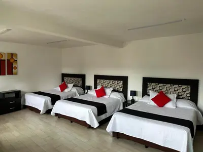 Cama o camas de una habitación en Vista Zacatlan Hotel