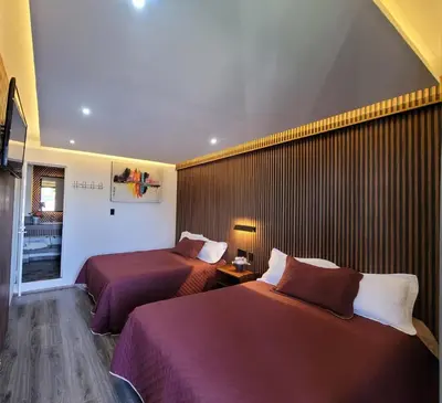 Cama o camas de una habitación en Vista Zacatlan Hotel