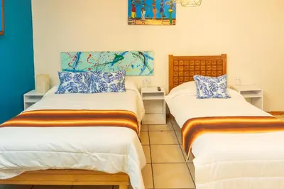 Cama o camas de una habitación en La Créme de la Créme Hostel