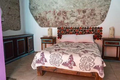 Cama o camas de una habitación en HOTEL BACANTES