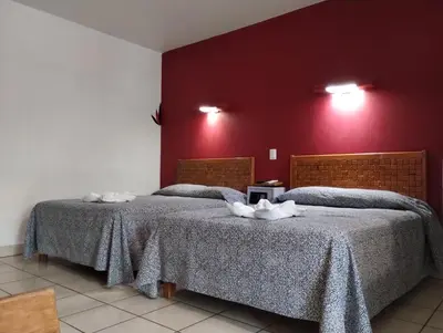Cama o camas de una habitación en Los Ciruelos Oaxaca