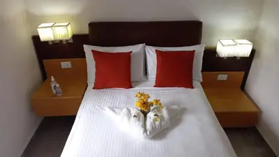 Cama o camas de una habitación en Club Campestre El Eden