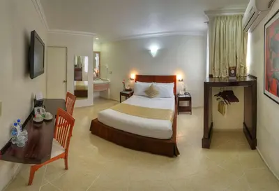 Cama o camas de una habitación en Best Western Taxco