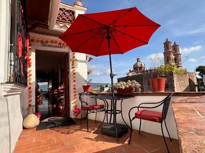 Un balcón o terraza de Hotel Mi Casita