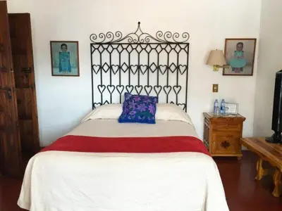 Cama o camas de una habitación en Hotel Mi Casita