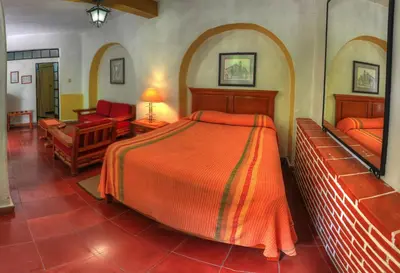 Cama o camas de una habitación en Hotel Posada San Javier