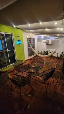 Zona de estar de El Arrecife: Apartamento con alberca a 10 minutos de la playa