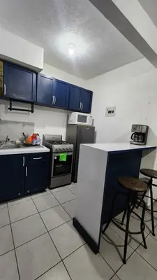 Una cocina o zona de cocina en El Arrecife: Apartamento con alberca a 10 minutos de la playa