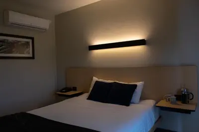 Cama o camas de una habitación en BV Hotel Atlixco