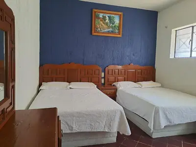 Cama o camas de una habitación en Casa Refugio Budget House 8 Rooms & 9 Bathrooms