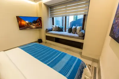 Cama o camas de una habitación en Casa Naila Hotel Boutique