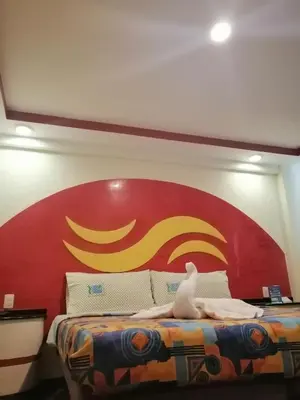 Cama o camas de una habitación en Hotel Atlántico