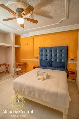 Cama o camas de una habitación en Alquería Central hotel
