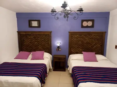 Cama o camas de una habitación en La Escondida Hotel Boutique