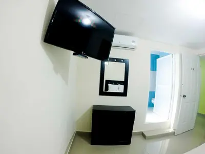 Una televisión o centro de entretenimiento en Hotel Puerto Real - Coatzacoalcos