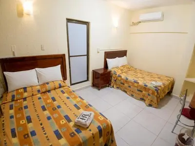 Cama o camas de una habitación en Hotel Puerto Real-Minatitlán
