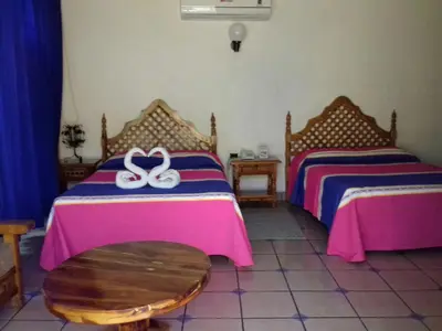 Cama o camas de una habitación en Hotel Colonial Rivera
