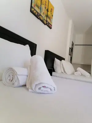 Cama o camas de una habitación en Standard Queen Room two beds