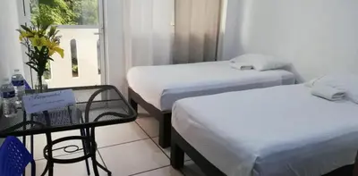 Cama o camas de una habitación en Standard room with two single beds for relaxed stay