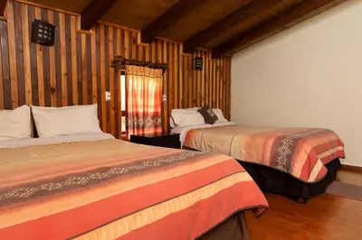 Cama o camas de una habitación en Cabañas Sierra Verde