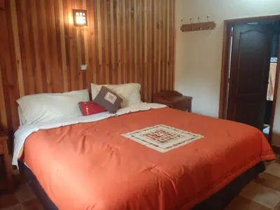 Cama o camas de una habitación en Cabañas Sierra Verde