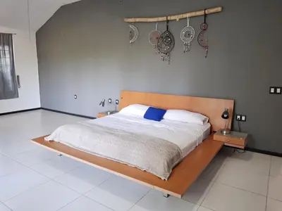 Cama o camas de una habitación en Villas Montserrat Wellness Center