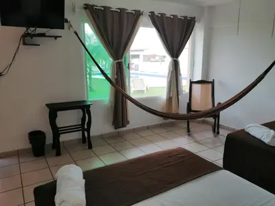Cama o camas de una habitación en Hotel Arrecife Chachalacas