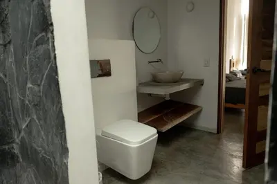 Un baño de Casa Diego Unique Ecological / Minimalist House & Inside Pool